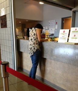Nallely registering for her fall semester classes at AWC San Luis Center. (By Kenia Romero) 