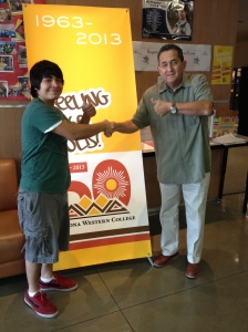 In figure 1, Group member Keven Urbina is shaking hands with Arnold Trujillo, after a successful interview at the San Luis learning Center on September 19, 2013.